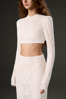 White sequin mesh lace co-ord set with a top and skirt from I.H.F Studio, featuring intricate lace and shimmering sequin details.