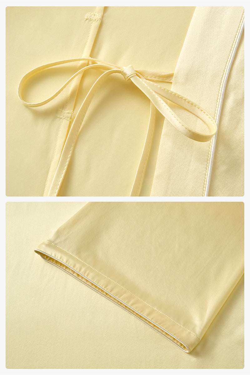 Not Just Pajama silk robe from the Timeless Collection in butter yellow, shown with soft fabric and elegant fit.