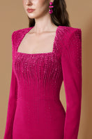 Pink crepe de chine silk-lined gown by I.H.F, featuring elegant fabric and flowing silhouette, displayed on a mannequin.