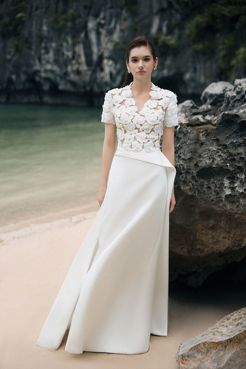 Lune De Soie white satin taffeta gown with elegant flowing design and intricate detailing, perfect for formal occasions.
