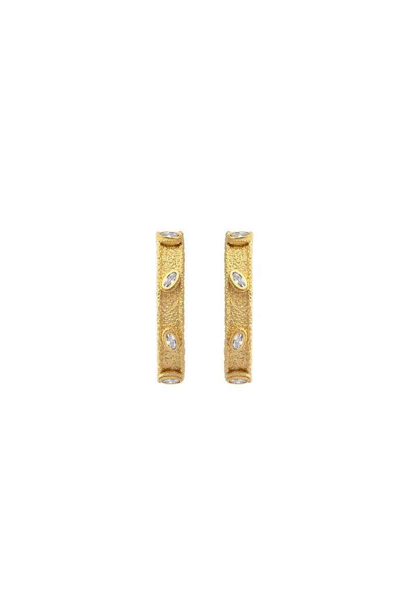 Peracas Salma earrings in white, stylish jewelry with elegant design, showing close-up of the white earrings on a plain background.