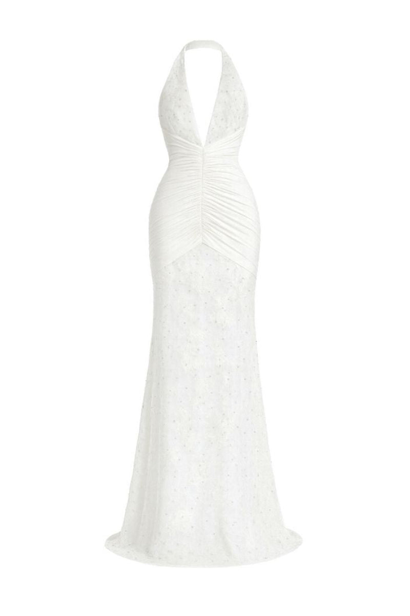 Khanum's Kaylin white maxi dress displayed on a hanger with flowing fabric and elegant design.