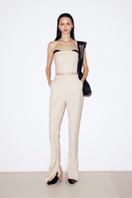 Beige wool mini corset top by ELENAREVA featuring a fitted design and structured style, displayed on a plain background.