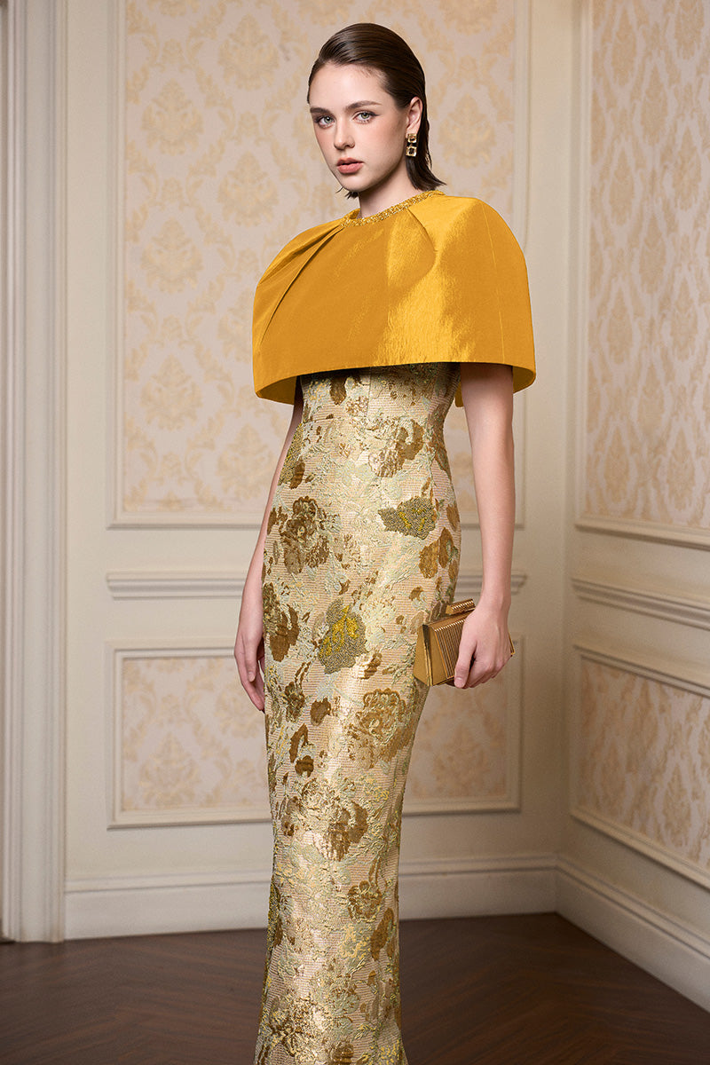 Yellow sleeveless floral gown with round neck from I.H.F, featuring a lightweight, flowing fabric and vibrant floral pattern.