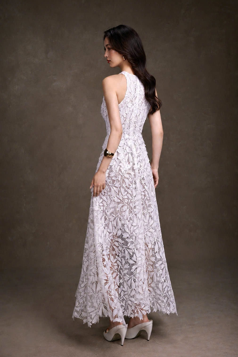 Keira Tong floral lace maxi dress with intricate lace details and a flowing silhouette, perfect for elegant occasions.