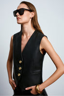 Black Ancient Poem vest by Acaria Studio featuring intricate embroidered designs on the front and a sleeveless fit.