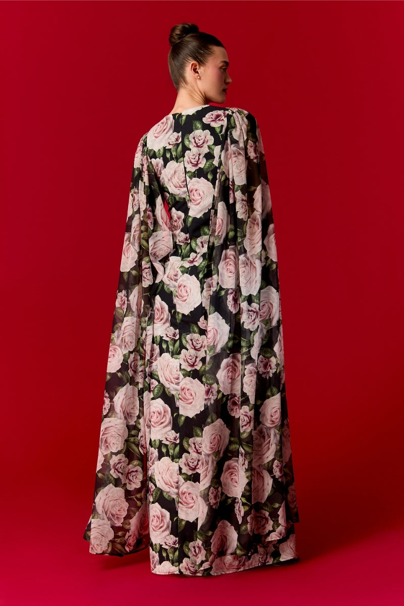 Nur Karaata Marianne maxi dress featuring a flowy silhouette, floral print, and sleeveless design perfect for summer occasions.