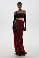 BalYKINA burgundy sequin maxi skirt featuring a flowing silhouette and shimmering embellishments, perfect for elegant occasions.