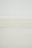 JINSUN ivory tweed maxi skirt with a textured woven fabric, full-length design, and classic high-waist silhouette.