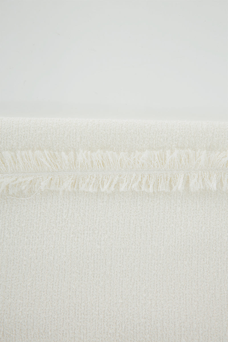 JINSUN ivory tweed maxi skirt with a textured woven fabric, full-length design, and classic high-waist silhouette.