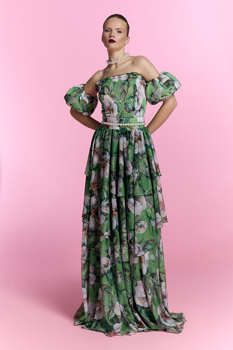 Nur Karaata Provence Poème gown featuring elegant floral embroidery and flowing fabric in a soft, romantic design.