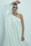 Nazlı Ceren Venus one-shoulder maxi dress in blanche, flowing white evening gown with elegant drape and asymmetric shoulder design.