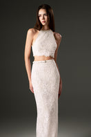 White halter mesh lace top and skirt co-ords set from I.H.F Studio, featuring intricate lace detailing and a stylish, fitted design.