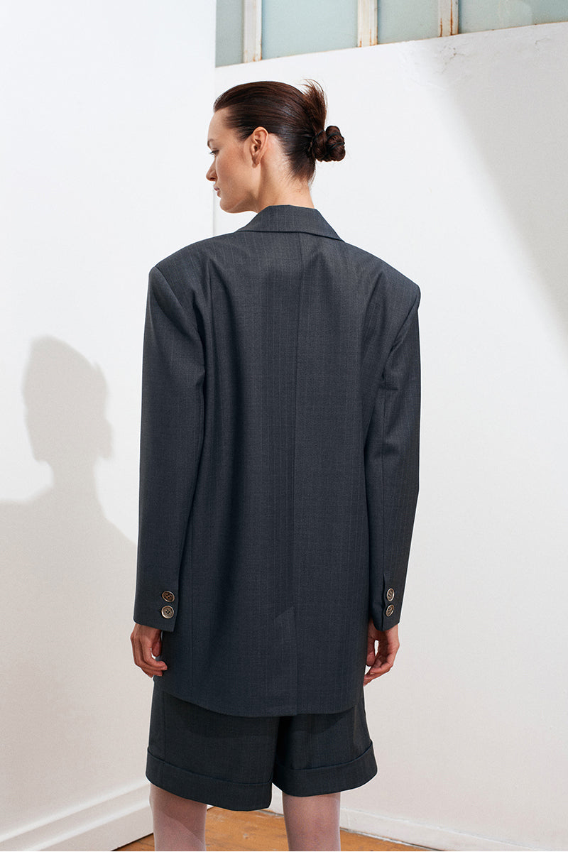 Gray striped blazer for men by Acaria Studio, featuring a tailored fit and classic blazer style.