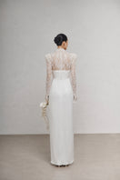 White Plan MIKOL maxi dress featuring a flowing silhouette and elegant design, perfect for summer or special occasions.