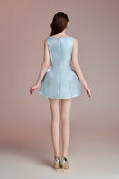 Blue Aurora mini dress by Do Long displayed on a model, featuring a fitted silhouette and stylish design.