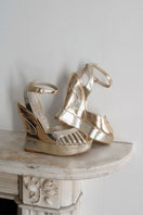 Gold Margaux heels by Terry de Havilland, featuring sleek design and stylish heel detail, perfect for elegant footwear.