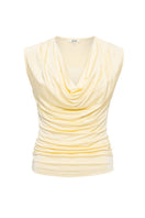 Yellow YLUNE LIQUID DRAPE top by SÉLONE, featuring a flowing fabric design in butter yellow, displayed on a model.