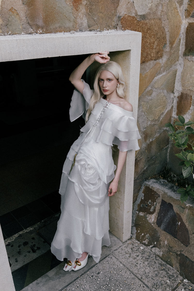 White Plan Thomas maxi dress featuring a flowing design and sleeveless style, perfect for casual or summer wear.