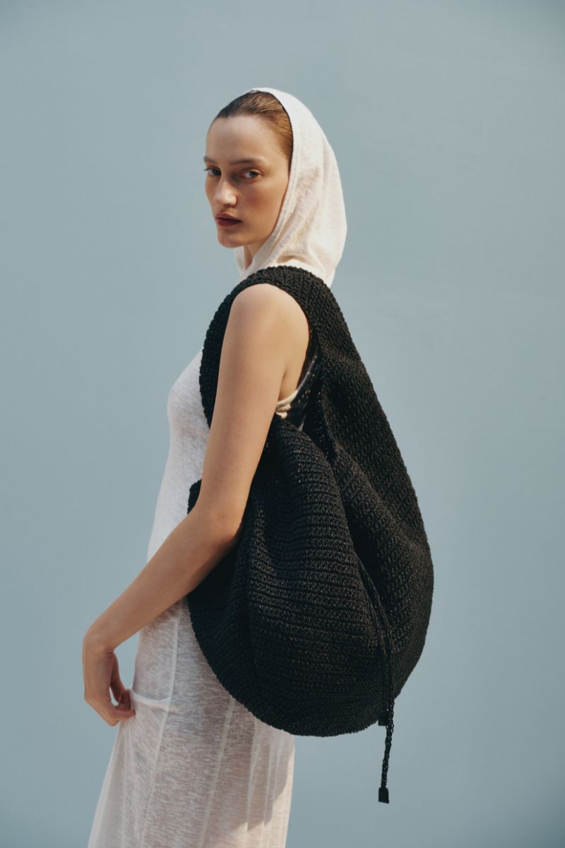 Black SIRENE shoulder bag by VIKELE STUDIO featuring a sleek design and shoulder strap, perfect for everyday use.