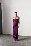 Nazlı Ceren Bridget long satin gown in spiced plum color, elegant evening dress with smooth fabric and flowing silhouette.