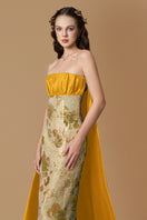 Elegant floral metallic jacquard and taffeta silk-lined gown by I.H.F, featuring intricate floral patterns and gold accents.