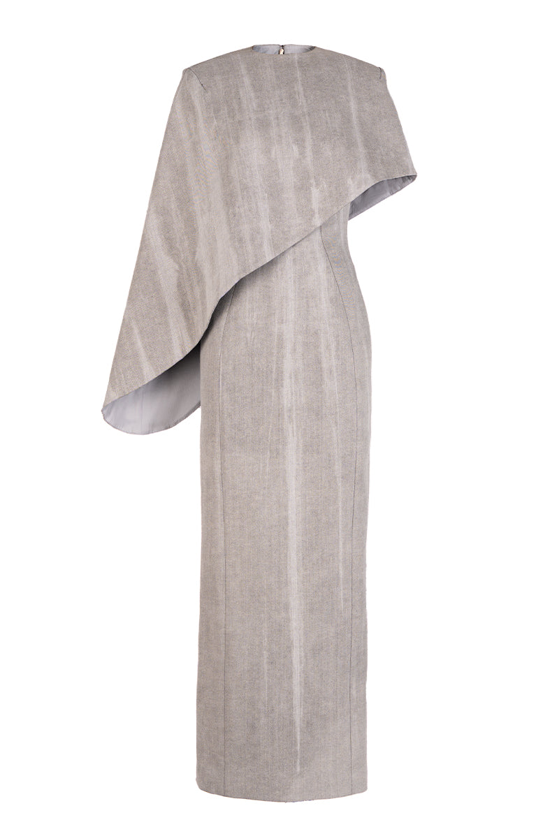 Light gray asymmetric draped cape sleeve column maxi dress by GVLUX, featuring elegant draping and a sleek silhouette.