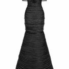 Long black cut-out gown by Phan Huy featuring elegant design with side cut-outs and flowing fabric, perfect for formal occasions.