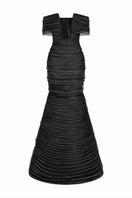 Long black cut-out gown by Phan Huy featuring elegant design with side cut-outs and flowing fabric, perfect for formal occasions.