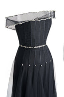 Black off-shoulder organza gown by Happy Clothing, flowing elegant dress with ruffled neckline and sheer lightweight fabric.