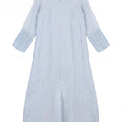 Shatha Essa embroidered maxi dress with side slit and inner dress visible, featuring intricate embroidery and flowing fabric.