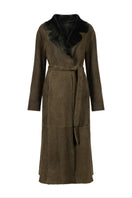 Verheyen Bella reversible shearling coat with plush shearling lining and stylish outer fabric, displayed on a hanger.