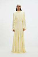 Deme By Gabriella Jeanie Maxi Dress featuring a flowy silhouette, floral print, and adjustable straps on a model.