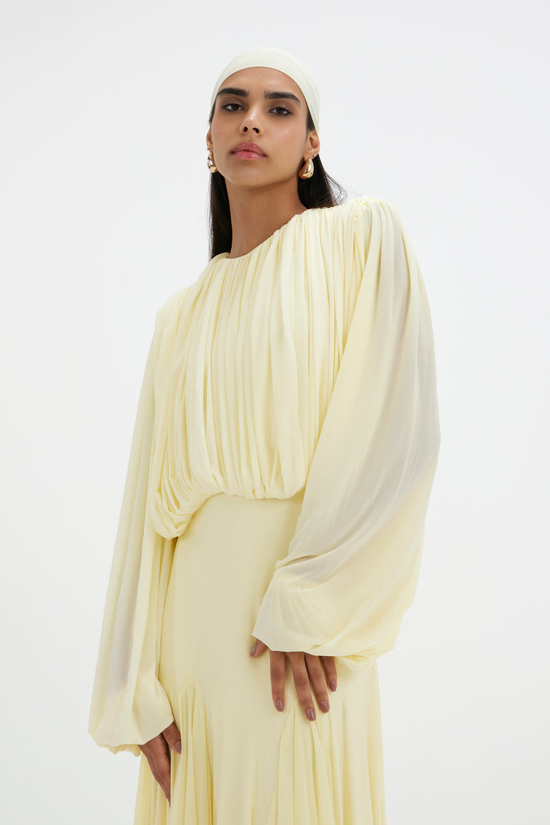 Deme By Gabriella Jeanie Maxi Dress in flowing fabric with a fitted waist and floral pattern, perfect for casual or dressy occasions.