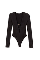 Black Kris Marán buckle bodysuit with stylish cutouts, featuring a fitted top design with metallic buckle accents.
