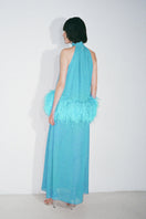 Nué Anaïs blue gown showcasing elegant fabric and flowing design, perfect for formal occasions.