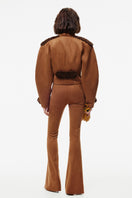 Kris Marán suede jacket with curly details in ginger and brown, stylish outerwear with textured accents and soft suede finish.
