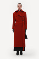 Red wool midi coat by Elenareva, stylish long coat with a tailored fit, displayed on a hanger in a fashion photo.