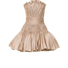Champagne beige short flared mini dress by Phan Huy, featuring a stylish and elegant silhouette with flared skirt and fitted bodice.