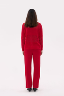 Red women's pants by La Granni, stylish and comfortable, shown on a model with a relaxed fit and soft fabric.