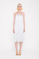 Valenciani white all-over fringe midi dress with flowing fabric and fringe details, elegant and stylish for special occasions.