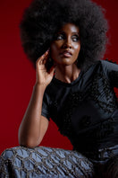 Black ZUSI T-shirt by Onalaja, featuring a fitted design and short sleeves, displayed on a neutral background.