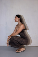 Black Soma maxi dress by Summer Away featuring a flowing silhouette and sleeveless design, perfect for casual or summer wear.