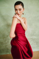 Elegant white Ruby Drape Couture gown with intricate detailing and flowing fabric, designed by White Plan.