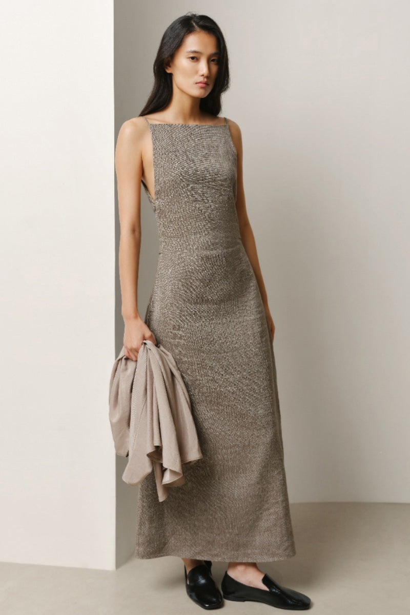 Lecia square-neck column maxi dress displayed on a hanger, showcasing its elegant design and flowing fabric.