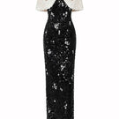Black Luna Cape Gown by HACCHIC COUTURE featuring flowing fabric and elegant design, perfect for formal occasions.