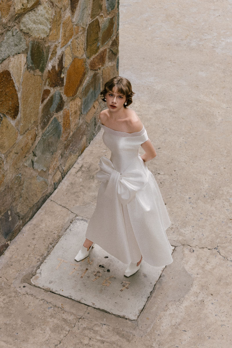 White Plan Charlotte Maxi Dress with flowing fabric and elegant design, perfect for casual or formal occasions.