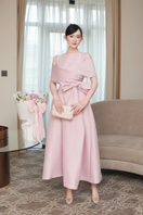 White Plan twin gown with long sleeves and elegant design, perfect for formal occasions or special events.