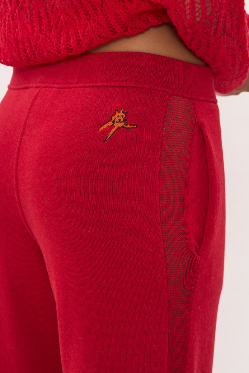 Red women's pants by La Granni, stylish and comfortable, displayed in a full-length view on a plain background.