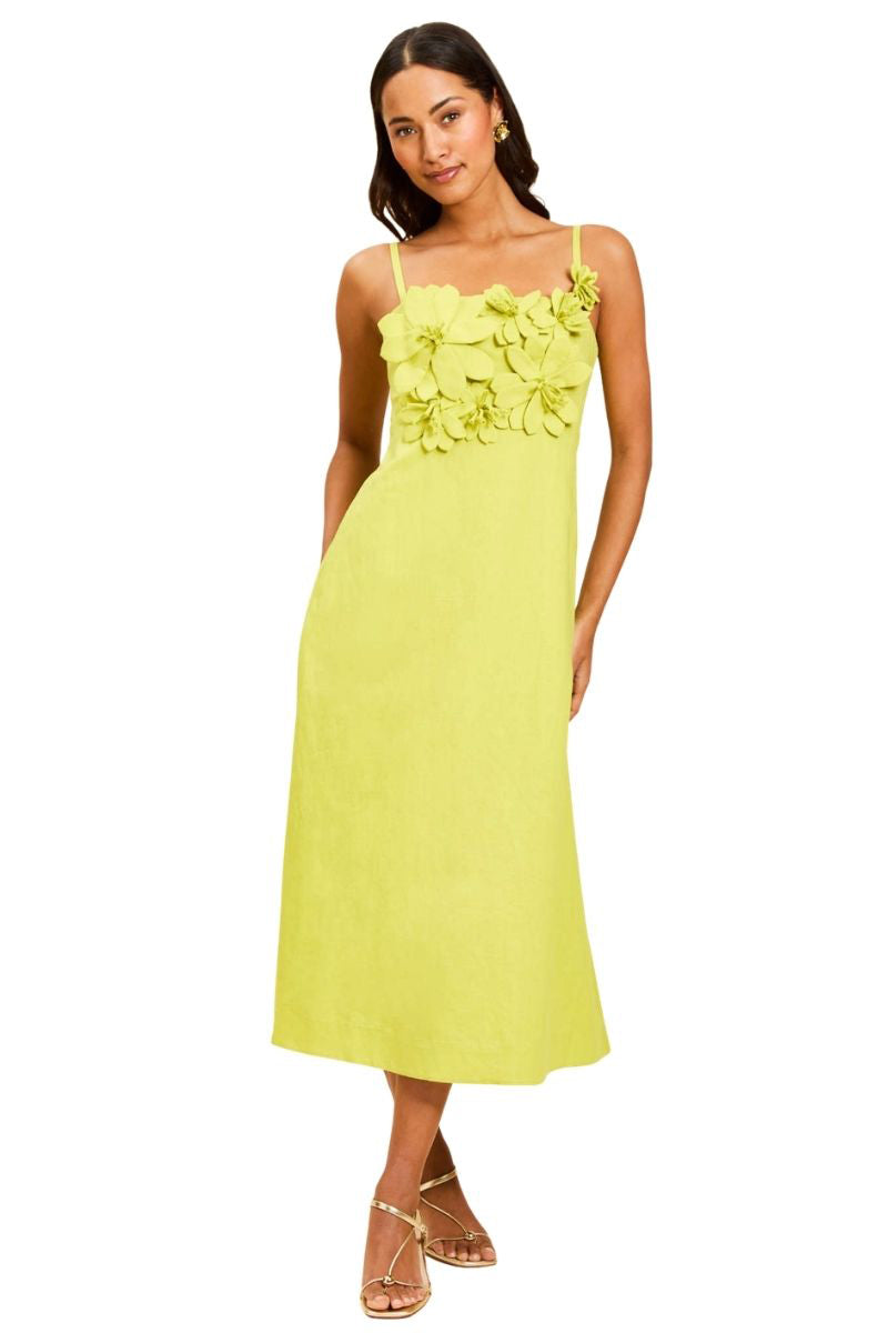 Mestiza New York Esperanza midi dress in vibrant citrus green with a fitted waist and flowing skirt, perfect for summer wear.